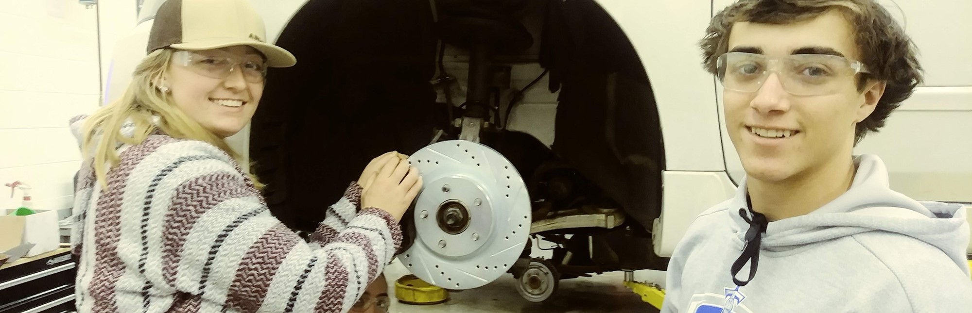 Students working in automotive shop