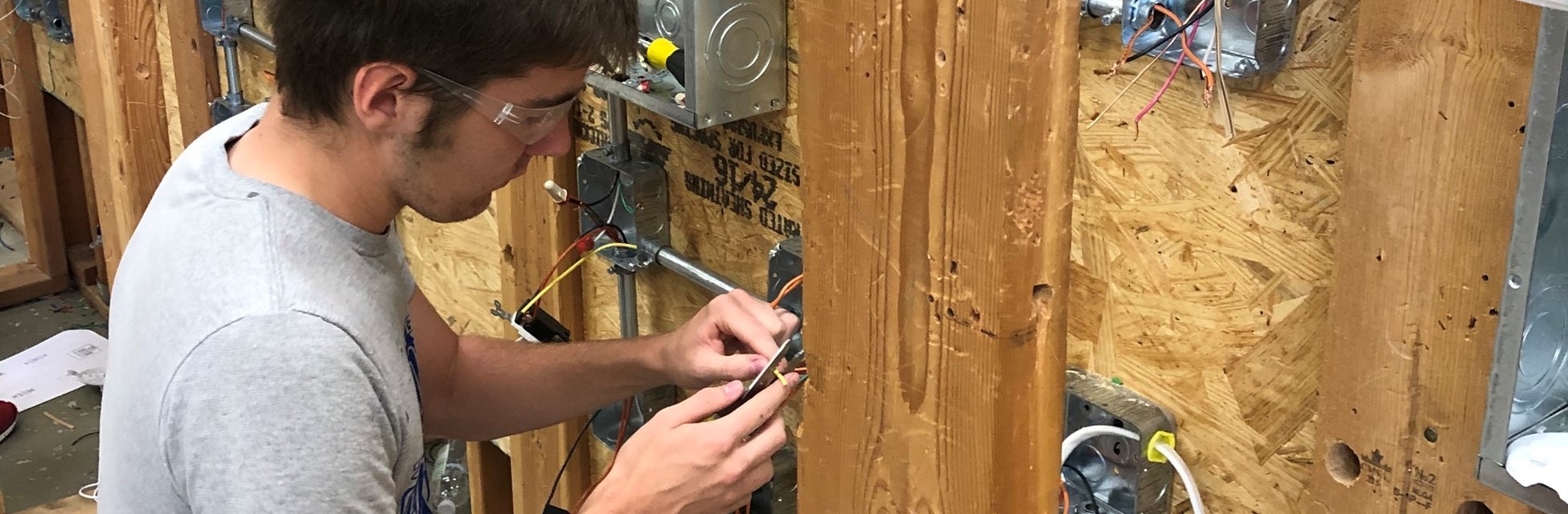 Student wiring in electrical technology class