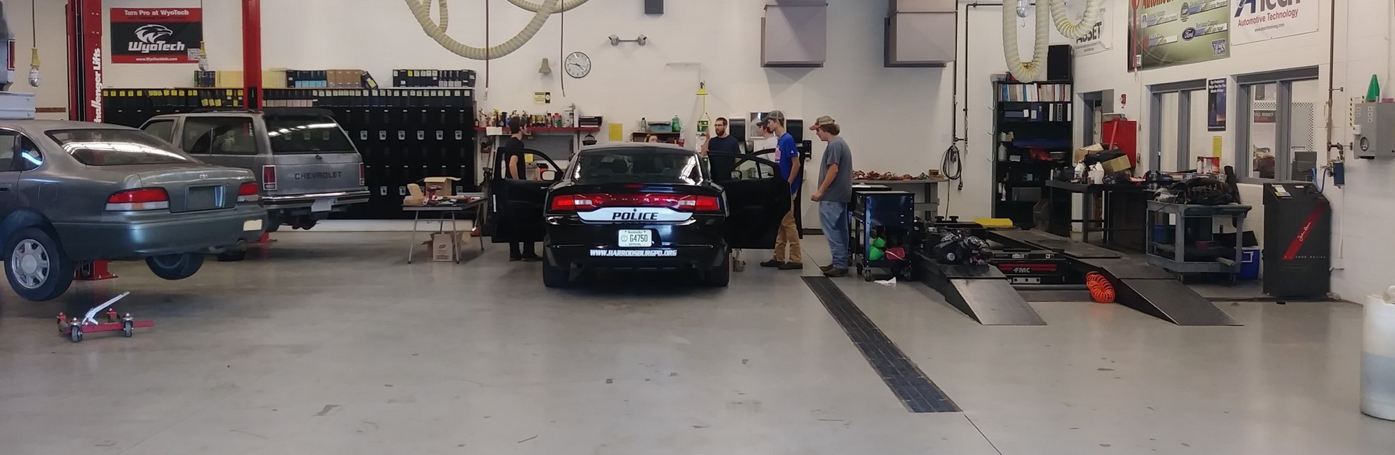 Students working in automotive technology